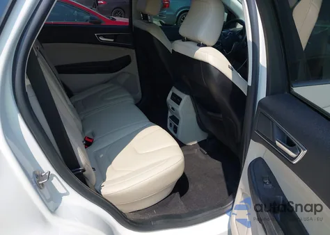 2021 Ford Edge Titanium z USA, uszkodzony, nr VIN 2FMPK4K98MBA18760